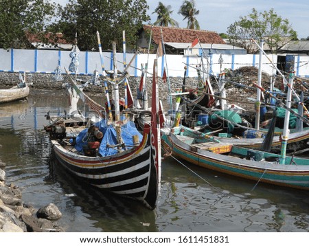 Landscape View of Harbor with Colourfull Fishing Boat and Fisher