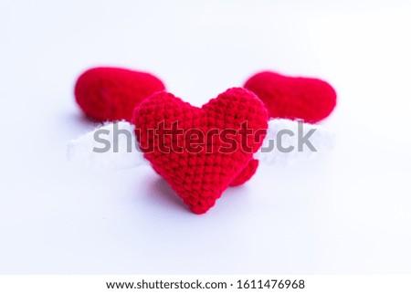 Beautiful red heart on a natural bokeh background. Valentine's Day .