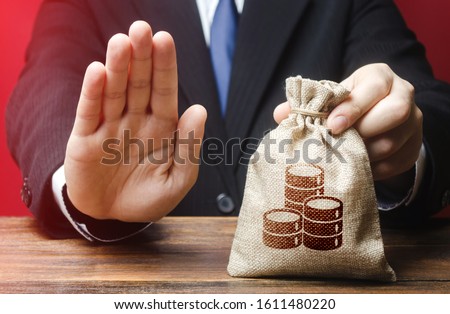 Businessman refuses to give money bag. Refusal to grant loan mortgage, bad credit history. Financial difficulties. Refuses cooperate. Economic sanctions, confiscation funds. Asset freeze seizure Royalty-Free Stock Photo #1611480220