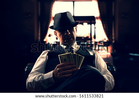 vintage Italian mafia gangster in 1930's in New York Royalty-Free Stock Photo #1611533821