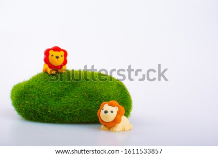 Lion rubber toys, cute animal shaped rubber doll isolated in white background