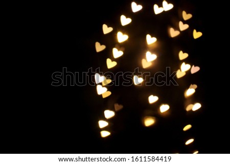 Overlay blurry background of golden hearts bokeh, for Valentine's or holidays card design