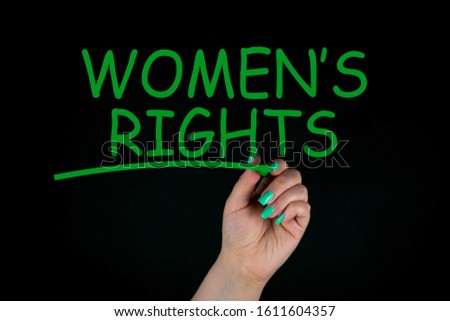 Women's Rights, Handwritten by a woman With Green Marker on black background