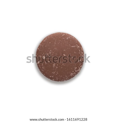 Giant Chocolate Button or Token made from roasted and ground cacao seeds. Large Milk Chocolate Candy Sweet. Isolated on White Background with Clipping Path Included in JPEG