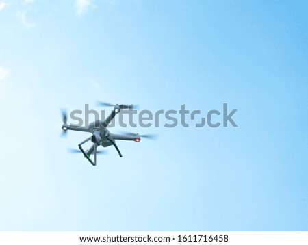 Close up Drone flying a cloudy sky