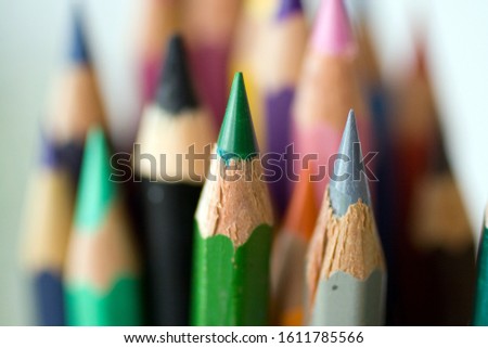 Color pencils with a blurry background.