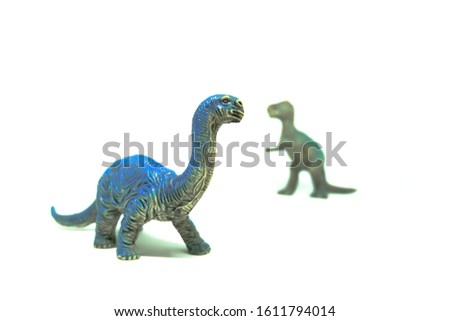 Closeup Image of Brontosaurus Plastic Dinosaurs Toy Isolated on White Background. Age of Extinction.