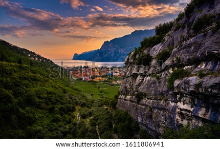 Panorama of Torbole a small town on Lake Garda, Italy. Europa, beautiful Lake Garda surrounded by mountains in the summer time