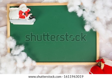 Christmas background concept. Christmas decorations in front of the green screen on the brown wooden floor.