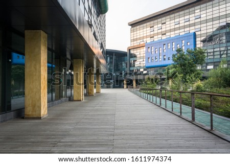 Modern city business building and empty ground