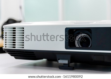 Close up White projector in the meeting room