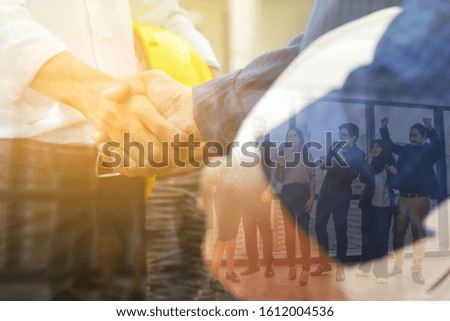 Double exposure of business handshake successful teamwork and partnership concept.Shake hands business agreement