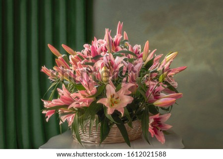 Still life with luxurious bouquet of pink lily flowers