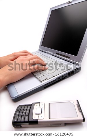 laptop with a mobile phone
