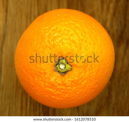Mandarin orange on wooden board. Food and ingredients background.