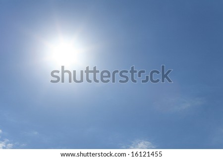 sun on blue sky background