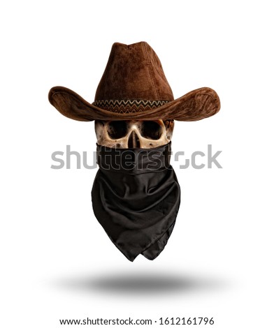 human skull in a wide-brimmed classic cowboy hat and bandanna hat Isolated on a white background Royalty-Free Stock Photo #1612161796