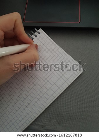 Notebook withou scriptures nexto to a pen