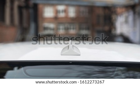 GPS antenna  on a roof of car.