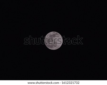 Full moon in a black background