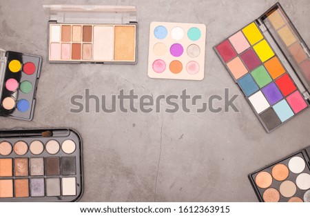 Make up and cosmetics sets for women on grey background