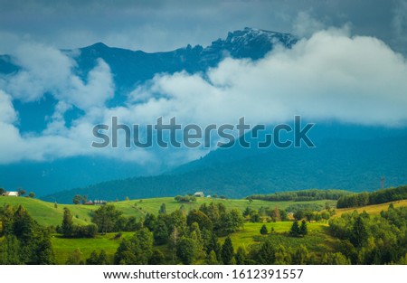 Bucegi Mountains seen from Moeciu Village. 26 September 2016, Piatra Craiului Mountains National Park, Transylvania, Romania