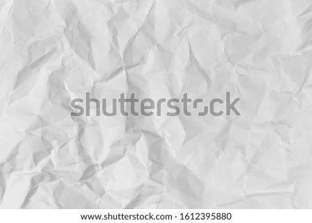 Picture of the blank white crumpled and creased paper, poster texture background with copy space