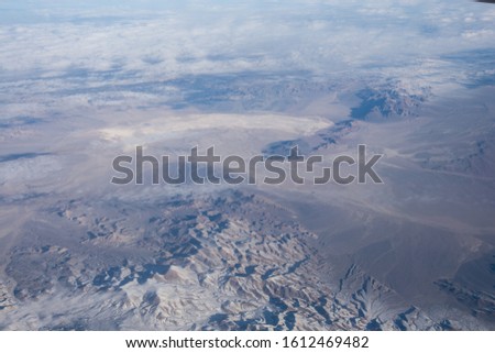 Desert lands of Nevada on aerial photography from airplane