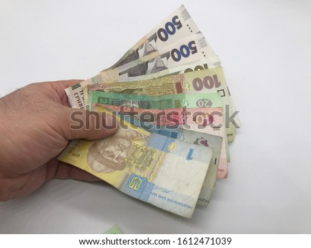 Ukrainian coins Hryvnia 500 100 20 5 obtained from different alternative compositions made of money counting and making money in the form of roll finance bank money counting sending money