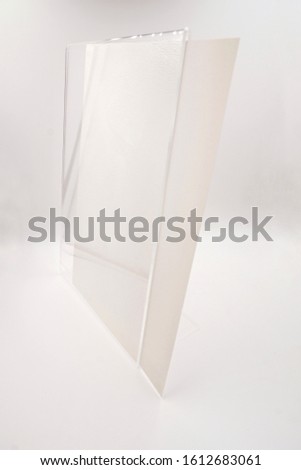Clear plastic table display stand
