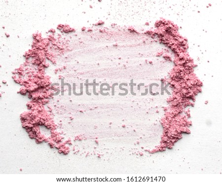 Vibrant pink powder and blush traces forming a square frame. A template for a makeup fashion business card, flyer, poster design with copy space