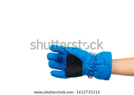 Hand with blue ski gloves, kids protection for hands. Isolated on white background. Copy space.