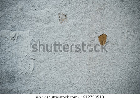 Texture of an old wall covered with paint. Background image of a worn paint coated surface