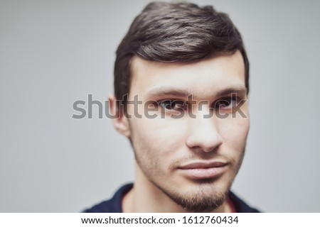 portrait of a young guy of Caucasian appearance 20-29 years old