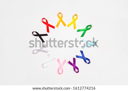 World cancer day concept, February 4. Circle of  colorful awareness ribbons on white background. Copy space for text. Healthcare and medicine concept. 