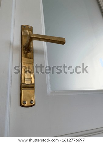 Old vintage golden door handle