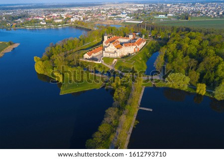 Spring landscape with the old Nesvizh castle. Belarus