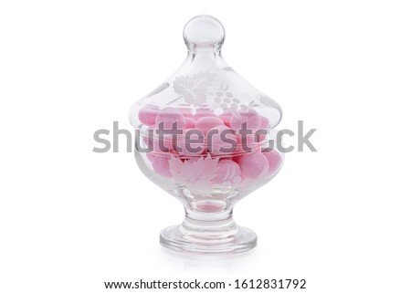 BonBons. Baby Pink BonBon Candy Sweets In Jar Pot. Strawberry Flavoured Candies. Macro Close up Shot Isolated on 255 White Background. Clipping Path Included in JPEG