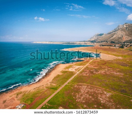 View from flying drone. Majestic summer scene of Monte Cofano National Park, Sicily, San Vito cape, Italy, Europe. Amazing morning seascape of Mediterranean sea. Traveling concept background.