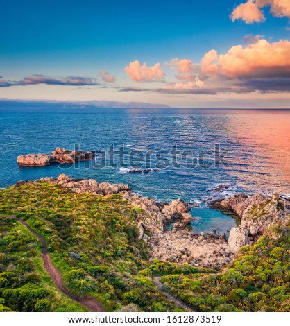 View from flying drone. Aerial morning view of Pool Of Venus. Amazing summer sunrise on Milazzo peninsula. Colorful morning scene of Sicily, Italy, Europe. Beauty of nature concept background.