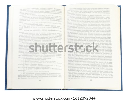 Open old hardcover book isolated on white, top view