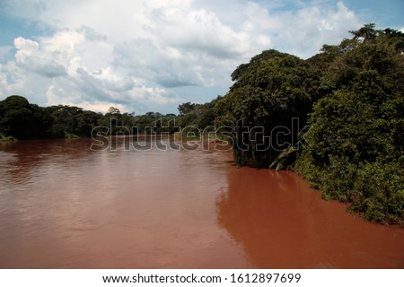The Ituri River is named after the section of the Central African Rainforest that it flows through as it makes its way as a tributary to the mighty Congo River Royalty-Free Stock Photo #1612897699