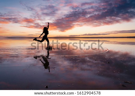 Dancing woman on salty lake. Ankara/Turkey-December/2019