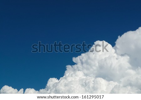 White fluffy clouds in a blue sky