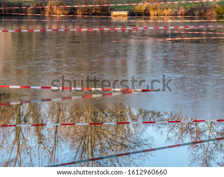 Blocking of a lake due to thawed ice