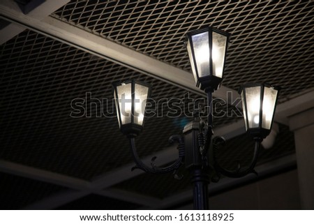Old nostalgic lamppost with closed up view in a dark place