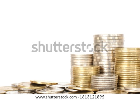 Stacks and pile of mixed golden and silver coins on white background. Finance, investment and retirement plan concept. 