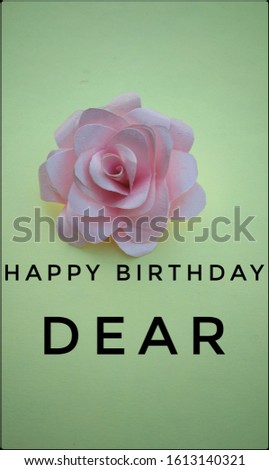 A papper's rose flower on green background with text, birthday wishes image walpapper