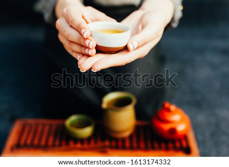Chinese tea ceremony Asian wooden table board chaban top view copy space morning energy. Breakfast green hot drink with caffeine traditional classic crockery tea set clay ceramic pot cups nature woods Royalty-Free Stock Photo #1613174332