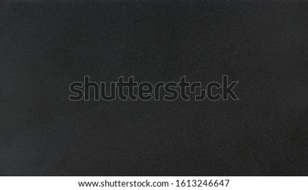 Clean matte dark metal background close up view Royalty-Free Stock Photo #1613246647